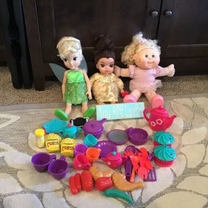 Set of dolls and play kitchen items